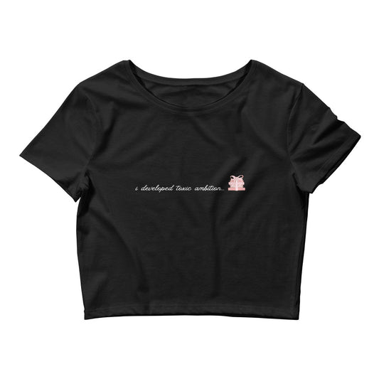 "i developed toxic ambition" Women’s Crop Tee